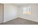 Carpeted bedroom offers a bright window and neutral tones at 1209 S 17Th St, Las Vegas, NV 89104