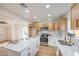 Bright kitchen boasts an island, stainless appliances, and a stylish faucet at 1209 S 17Th St, Las Vegas, NV 89104