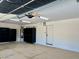 Garage including storage cabinets and shelving at 1921 Moonlight Bluff Ave, North Las Vegas, NV 89084