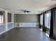 Spacious living room featuring built-in shelves and cabinetry at 1921 Moonlight Bluff Ave, North Las Vegas, NV 89084