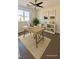 Bright office with natural light, modern desk, and neutral decor at 1921 Moonlight Bluff Ave, North Las Vegas, NV 89084
