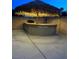 Outdoor covered bar area is the perfect spot for entertaining at 1921 Moonlight Bluff Ave, North Las Vegas, NV 89084