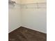 Walk-in closet with plush carpeting and wire shelving installed at 1921 Moonlight Bluff Ave, North Las Vegas, NV 89084