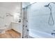Well-appointed bathroom with a tub and shower combination, featuring neutral tones and natural light at 1953 Moyer Dr, Henderson, NV 89074