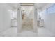 Modern bathroom with double vanity and a glass-enclosed shower at 1953 Moyer Dr, Henderson, NV 89074