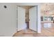 Hallway leading to living area with new laminate wood flooring at 1953 Moyer Dr, Henderson, NV 89074