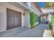 Covered outdoor patio area with ample seating space and sliding glass door access at 1953 Moyer Dr, Henderson, NV 89074