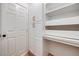 Custom built-in storage and desk area featuring ample shelving and cabinets at 1953 Moyer Dr, Henderson, NV 89074