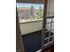 View from the balcony overlooking landscaped common area with neighborhood buildings in the background at 2212 Sunfish Dr # D, Henderson, NV 89014