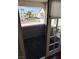 Outdoor balcony with views of a well-maintained community and palm trees at 2212 Sunfish Dr # D, Henderson, NV 89014