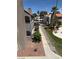 Attractive condo community featuring lush landscaping, serene walkways, and a refreshing pool area at 2212 Sunfish Dr # D, Henderson, NV 89014