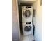 Laundry room featuring a stacked washer and dryer at 2212 Sunfish Dr # D, Henderson, NV 89014