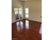 Living room with hardwood floors, large windows, and natural light at 2212 Sunfish Dr # D, Henderson, NV 89014