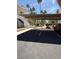Assigned covered parking for the condominium with desert landscaping in background at 2212 Sunfish Dr # D, Henderson, NV 89014