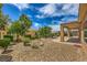 The backyard has a covered patio, drought-tolerant landscaping, and plenty of space at 2365 Wisconsin Dells Dr, Henderson, NV 89044