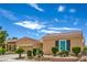 Attractive single-story home featuring a well-kept yard and an attached two-car garage at 2365 Wisconsin Dells Dr, Henderson, NV 89044