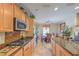 Beautiful kitchen with modern appliances and a view into the dining area at 2365 Wisconsin Dells Dr, Henderson, NV 89044