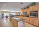 Modern kitchen with granite countertops, stainless steel appliances, and a large island at 2365 Wisconsin Dells Dr, Henderson, NV 89044