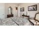 Comfortable bedroom with vintage decor, framed pictures, and natural lighting at 2507 Silent View Ave, Henderson, NV 89044