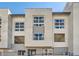 Contemporary townhome facade with large windows and private balcony spaces at 2507 Silent View Ave, Henderson, NV 89044
