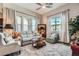 Bright living room with ample natural light, comfortable furniture, and neutral decor at 2507 Silent View Ave, Henderson, NV 89044