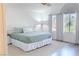 Bright bedroom with a cozy bed and ample natural light at 2549 Sundew Ave, Henderson, NV 89052