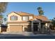 Charming two-story home with a three car garage and a well-maintained front yard at 2549 Sundew Ave, Henderson, NV 89052