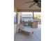 Relaxing outdoor space with an outdoor kitchen, perfect for entertaining at 2549 Sundew Ave, Henderson, NV 89052