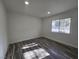 Bright bedroom with laminate floors, a large window, fresh paint and ample natural light at 3056 Garnet Ct, Las Vegas, NV 89121