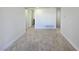 This bedroom features neutral carpeting and a hall closet for storage at 3056 Garnet Ct, Las Vegas, NV 89121