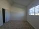 Bedroom with neutral walls, carpet flooring and a sliding closet at 3056 Garnet Ct, Las Vegas, NV 89121