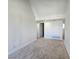 This bedroom features neutral carpeting, an alcove, and recessed lighting at 3056 Garnet Ct, Las Vegas, NV 89121