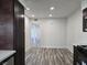 Spacious kitchen with new flooring and an open layout to the living area at 3056 Garnet Ct, Las Vegas, NV 89121