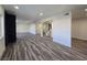 Spacious living room with new flooring and recessed lighting throughout at 3056 Garnet Ct, Las Vegas, NV 89121