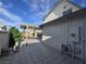 The spacious tiled patio offers a shaded outdoor area with a view of the backyard pool at 3056 Garnet Ct, Las Vegas, NV 89121