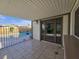 Relax on the covered patio, featuring tiled flooring and access to the refreshing backyard pool at 3056 Garnet Ct, Las Vegas, NV 89121