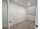 Small empty carpeted room with white walls and baseboards at 3056 Garnet Ct, Las Vegas, NV 89121