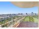 Tiled balcony with stunning views of Las Vegas, golf course, and desert landscape at 3111 Bel Air Dr # 24G, Las Vegas, NV 89109