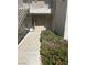 Beautifully maintained building exterior near walkways and stairs to a residential entry at 3150 Soft Breezes Dr # 1033, Las Vegas, NV 89128