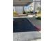 Designated parking spot, adjacent to walkways leading to building, ensures convenience at 3150 Soft Breezes Dr # 1033, Las Vegas, NV 89128