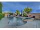 Beautiful backyard showcases a pool and spa with mature landscaping and hardscape accents at 3632 Red Fir St, Las Vegas, NV 89135