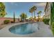 Lush backyard oasis features a swimming pool, mature landscaping, and a private outdoor space at 3632 Red Fir St, Las Vegas, NV 89135