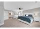 Light and airy bedroom with white furniture, a ceiling fan and carpet at 3632 Red Fir St, Las Vegas, NV 89135