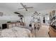 Comfortable bedroom with ceiling fan, bed and decor at 3632 Red Fir St, Las Vegas, NV 89135
