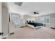 Spacious bedroom with white furniture and a ceiling fan at 3632 Red Fir St, Las Vegas, NV 89135