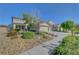 Charming two-story home featuring a three-car garage, neutral paint scheme and rock landscaping at 3632 Red Fir St, Las Vegas, NV 89135
