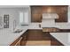 Elegant kitchen boasts stainless steel appliances, dark cabinetry, and stylish countertops at 3632 Red Fir St, Las Vegas, NV 89135