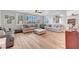 Bright living room features hardwood floors, plantation shutters, and comfortable seating arrangements at 3632 Red Fir St, Las Vegas, NV 89135