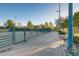 Serene walking path lined with trees and benches, perfect for relaxing strolls at 3632 Red Fir St, Las Vegas, NV 89135