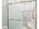Luxurious bathroom featuring a frameless shower with seating and grab bars at 371 Legacy Dr, Henderson, NV 89014